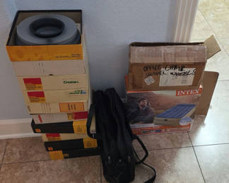Lot 72: Assorted slide trays, casters, bag, and air mattress