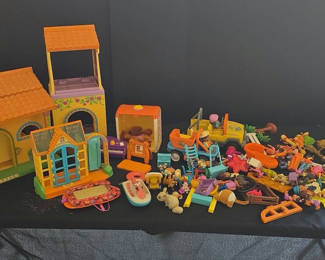 Lot 1: Colorful plastic toy houses and assorted figures