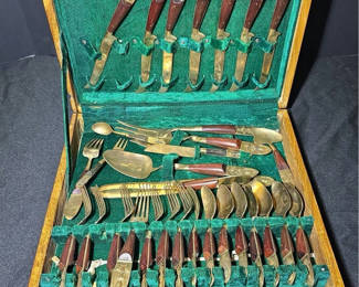 Lot 54: Antique brass-and-wood cutlery set in wooden case