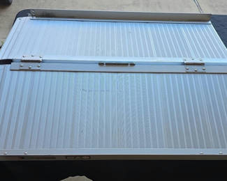 Lot 3: Foldable aluminum ramp panels with Pride branding