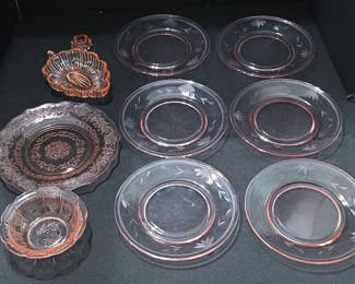 Lot 13: Pink etched glass dinnerware with amber accents
