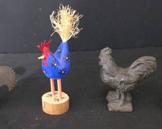Lot 56: Assorted rooster figurines with decorative glass piece