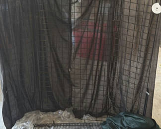 Lot 100: Foldable black metal wire wall for jewelry display with fabric screen