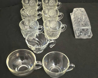 Lot 26: Crystal glassware set with teacups, tumblers, and a butter dish