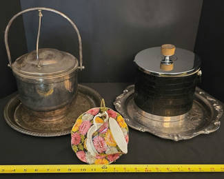 Lot 33: Vintage Silver Plated Ice Bucket and metal leather wrapped ice bucket with floral teacup and saucer on trays