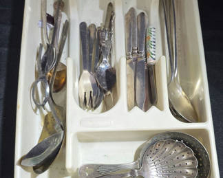 Lot 49: Assorted flatware and serving utensils