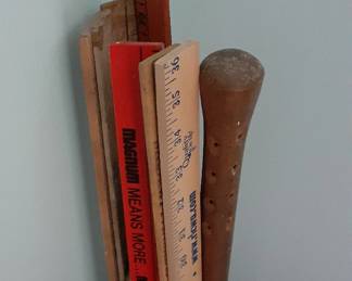 One of the containers of yardsticks