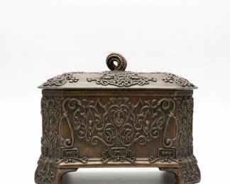 Assortment of Decorative Home Accents including Ornate Boxes, Brass Cannon Figurine, Mosaic Candle Holder, Glass Candlesticks, and Finished Vase