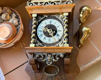 Vintage Dutch Zaanse clock, includes original pear shaped brass weights and mounting hardware, and the Old Dutch inscription "Nu Elck Syn Sin"