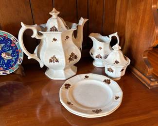Antique Victorian White Ironstone Tea/Coffee service in Chelsea Grape design. Includes creamer, sugar bowl with lid, tea/coffee pitcher and two plates. Circa 1850-1890s