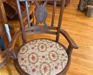 Antique Edwardian or late Victorian carved oak captain's style desk chair. 1900-1915