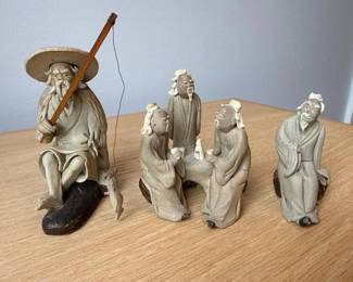 062 setofmudmenfigurineswithfisherman