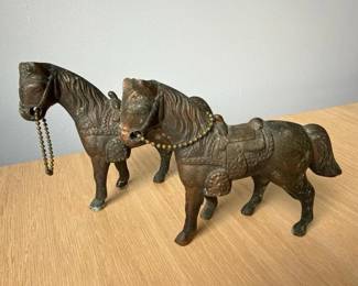 002 paircastmetalhorsefigurineswithsad