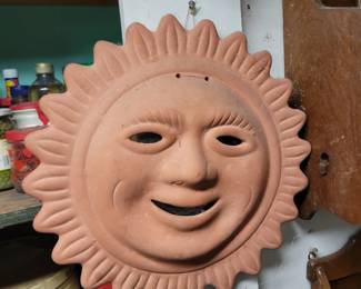 Add a touch of Southwest charm with this decorative terracotta sun face wall plaque available at our Danbury, CT private estate sale. Browse unique garden décor, patio accents, pottery, folk art, outdoor decorations, wall hangings, and one-of-a-kind home décor alongside antiques, collectibles, and vintage treasures throughout the home. A great find for gardeners, home decorators, collectors, and anyone searching for distinctive estate sale treasures. Everything must go!