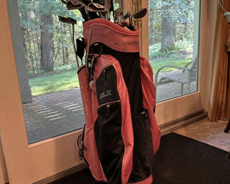 Lot 167: Pink Golf Bag with Clubs