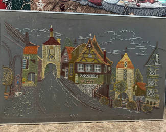 Lot 184: Needlepoint village street scene framed artwork