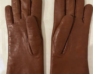 Lot 17: Coach Brown leather gloves with white shearling lining