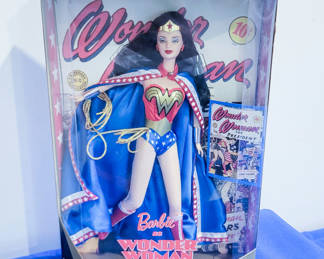 Lot 78: Barbie Collector Edition dolls in boxes: Wonder Woman and Coca-Cola fashion