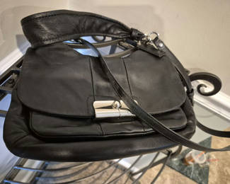 Lot 9: Coach: Black leather handbag with top flap