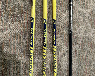 Lot 166: Golf clubs with yellow shafts and a black driver