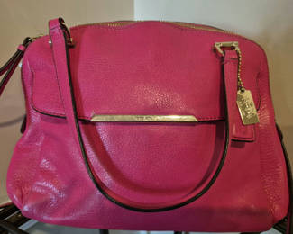 Lot 14: Coach pink leather handbag with gold hardware