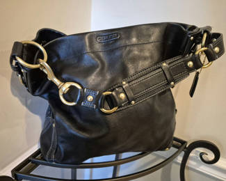Lot 11: Coach black leather handbag with brass hardware