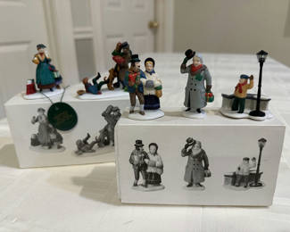 Lot 117: Heritage Village Collection: Don't Drop the Presents! (2) and A Christmas Carol Morning (3) with additional figures