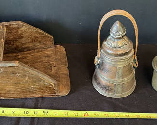 Lot 3: Antique wooden hand plane, metal bell with lid, and mortar and pestle set