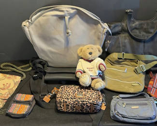 Lot 76: Assorted handbags and accessories with a teddy bear