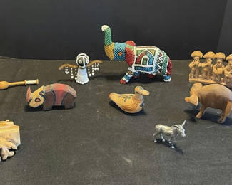 Lot 74: Assorted wooden carvings and beaded figurines