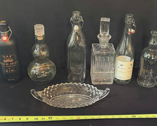Lot 27: Assorted glass bottles, decanters and crystal dishware