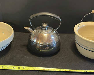 Lot 64: Cream ceramic bowl with blue bands, a black tea kettle, and a cream ceramic tub with wire handle