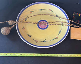 Lot 18: Yellow ceramic bowl with stand, striped tile, and decorative rope tassels