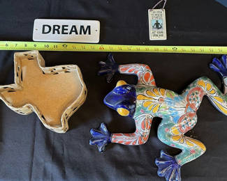 Lot 5: Colorful ceramic lizard sculpture with woven Texas-shaped basket and decorative signs