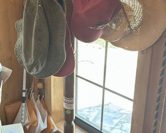 Lot 51: Assorted Hats on a Hat Stand