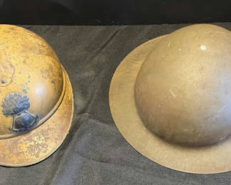 Lot 87: Two vintage helmets: Brodie-style steel helmet with insignia and a pith helmet