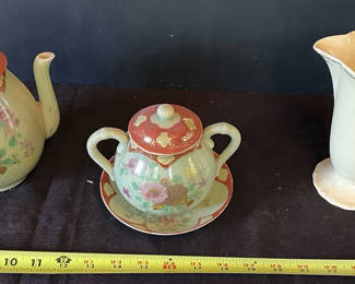 Lot 11: Vintage porcelain tea set with floral and maritime motifs