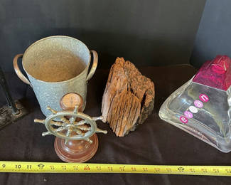 Lot 2: Nautical decorative items with ship wheel, bucket, and glass bottle