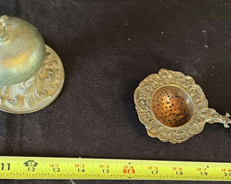 Lot 10: Antique brass ornate sifter and antique bell