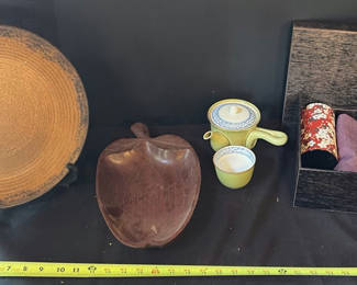 Lot 40: Ceramic teapot set, large glaze plate, wooden leaf vessel, and patterned fabrics