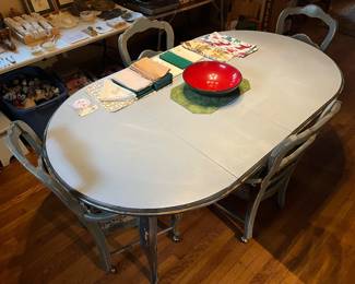 Dining table with four chairs.