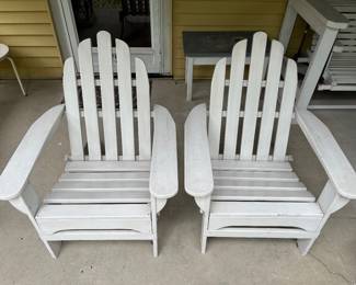 Two Adirondack chairs.