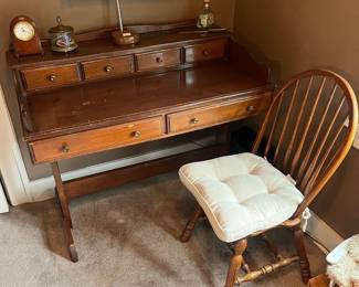 Vintage tavern or trestle desk; Windsor-style spindle-back chair.