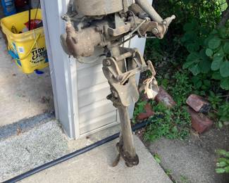Antique outboard motor and tank