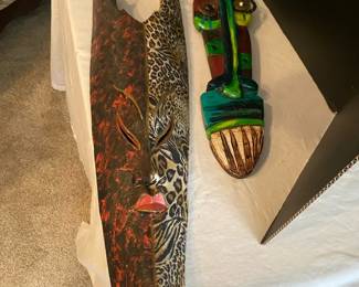 A Carved Mask And A Novice Peruvian Piece