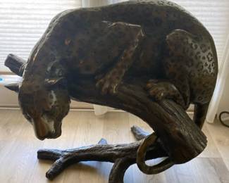001 Bronze Leopard Perched On A Tree Branch