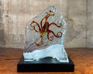 “Octopus Realm”, an original limited edition lucite sculpture by listed artist, Robert Wyland. Edition 85/450, in excellent condition, and comes on a lighted plinth. This sculpture measures on lighted plinth, 14.25” H x 12” W x 8” D.