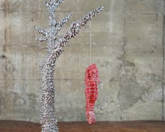 “Seahorse on Staghorn Coral”, an original limited edition sculpture by listed artist, Clarita Brinkerhoff. 6,252 pieces of Swarovski crystals, cast polished rhodium plated on a granite base. Edition 48/150, signed, and measures, 21.5” H x 11” W x 7.5” D.