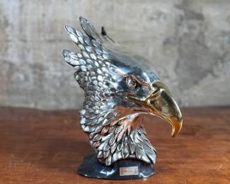 This lot features an impressive eagle bust sculpture, silver-plated and manufactured by Kkala out of Mexico. This bust measures, 11” H.