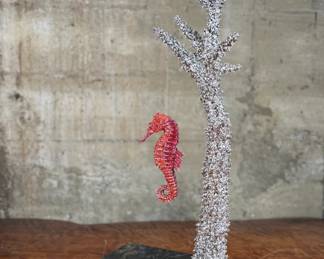 “Seahorse on Staghorn Coral”, an original limited edition sculpture by listed artist, Clarita Brinkerhoff. 6,252 pieces of Swarovski crystals, cast polished rhodium plated on a granite base. Edition 48/150, signed, and measures, 21.5” H x 11” W x 7.5” D.